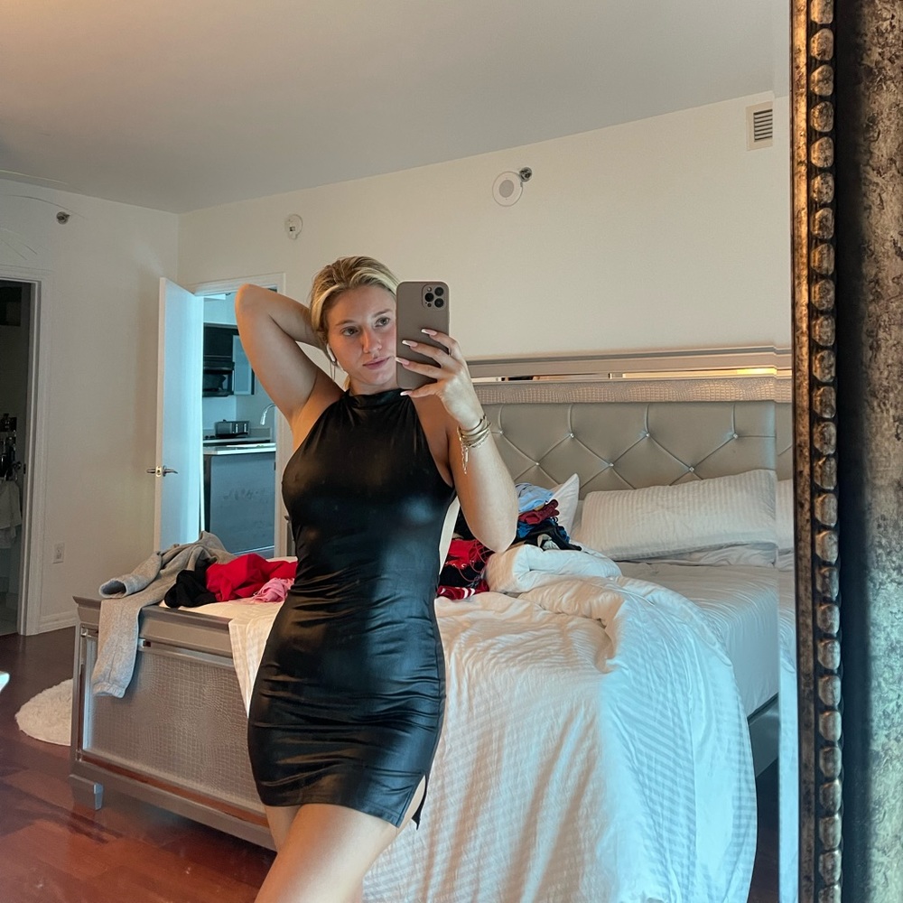 Super down black super sexy faux leather dress worn once very good quality.